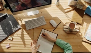 person learning at their desk